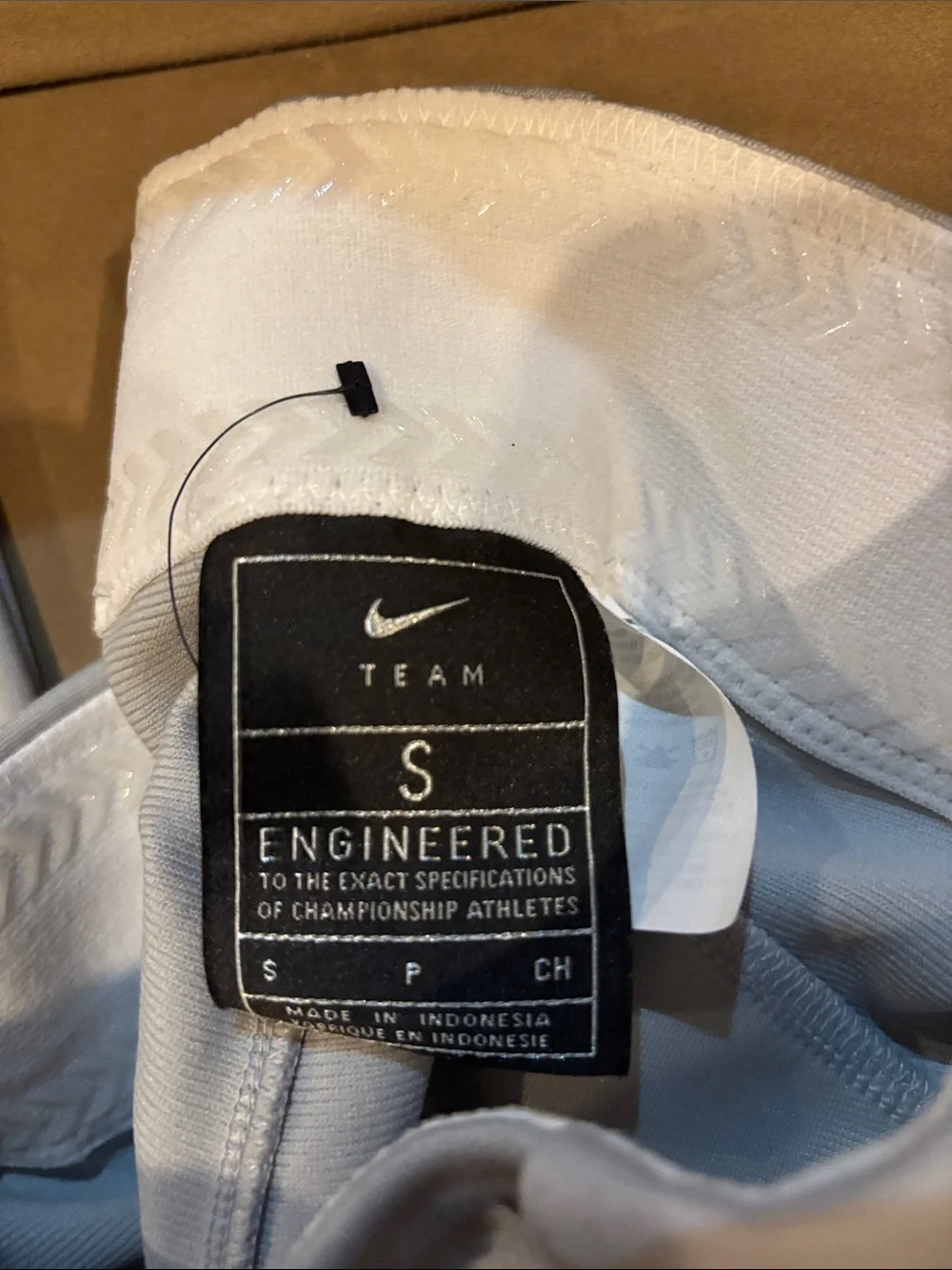 Nike Kids Light Gray Jogger Baseball Pants with Black Swoosh